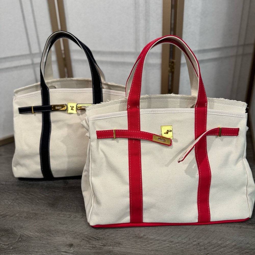 Neutral Canvas Tote with Navy Trim and Gold Hardware - Picture 4 of 6